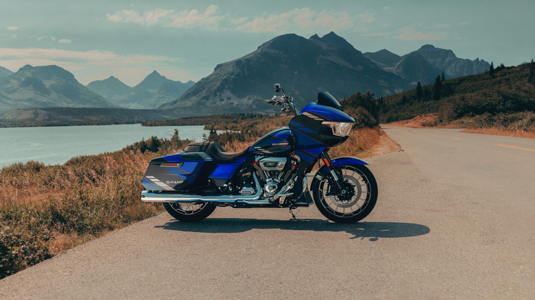 Side view of a Harley Davidson CVO Road Glide parked on a scenic road