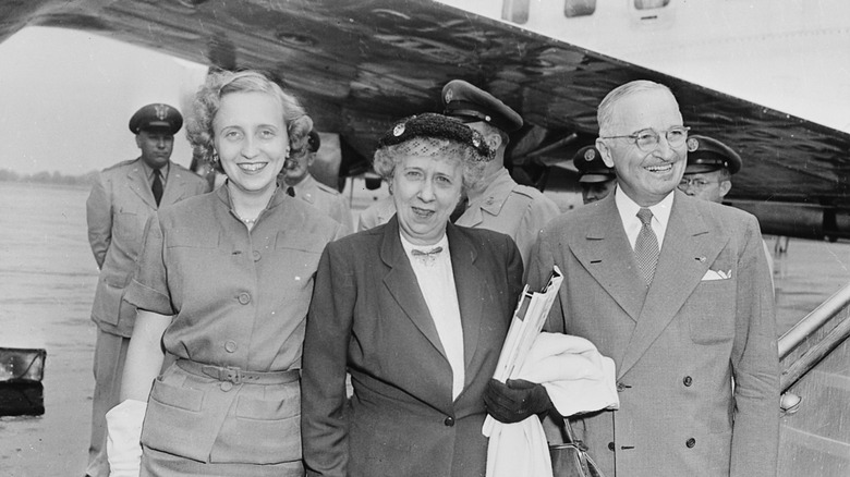 President Truman stands with family members in front of The Independence.