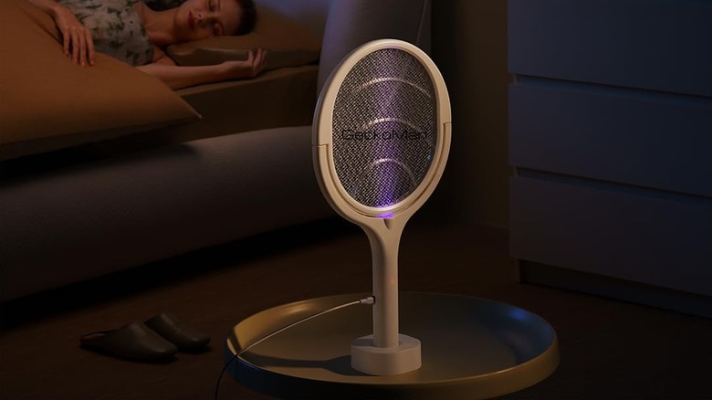 electric fly swatter on table