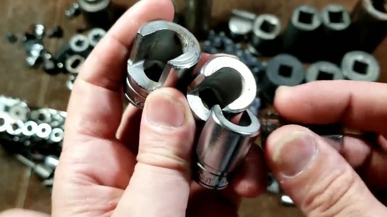 a person showing several weatherhead sockets