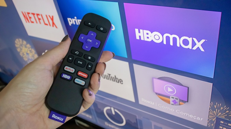 Roku remote with HBO Max on TV