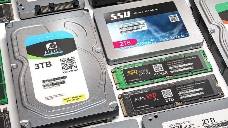 Various HDDs and SSDs arranged on a surface