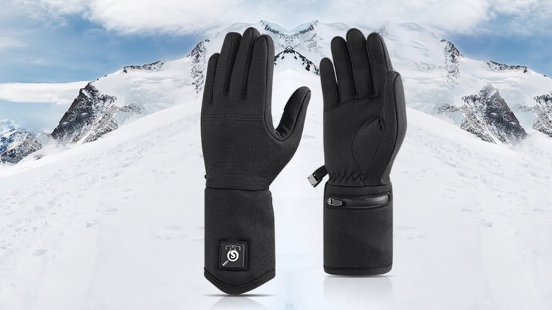Heated glove liners with snowy mountain background
