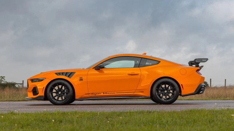 Side view of an orange 2026 Hennessey Super Venom Mustang