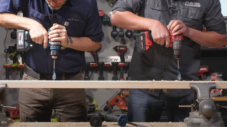 Two people use Hercules 20V Drill Beat Milwaukee M18 Fuel Drill side by sid