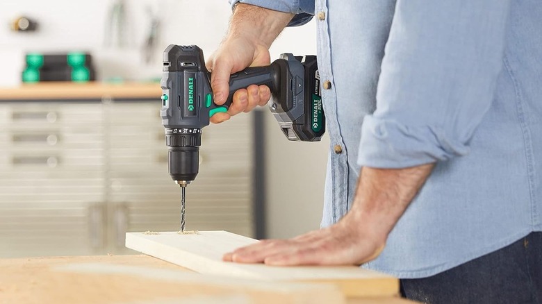 Denali by Skil drill being used to drill into wood