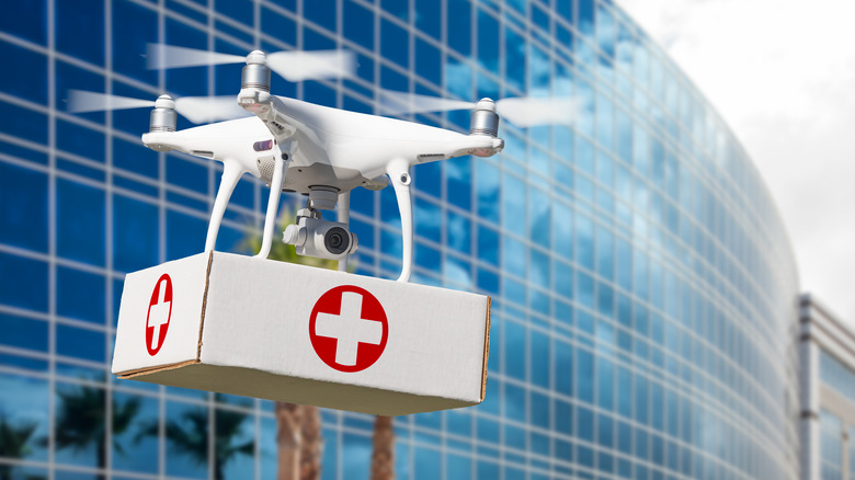 drone carrying medical supplies through commercial buildings