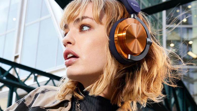 Woman wearing the Dyson OnTrac headphones