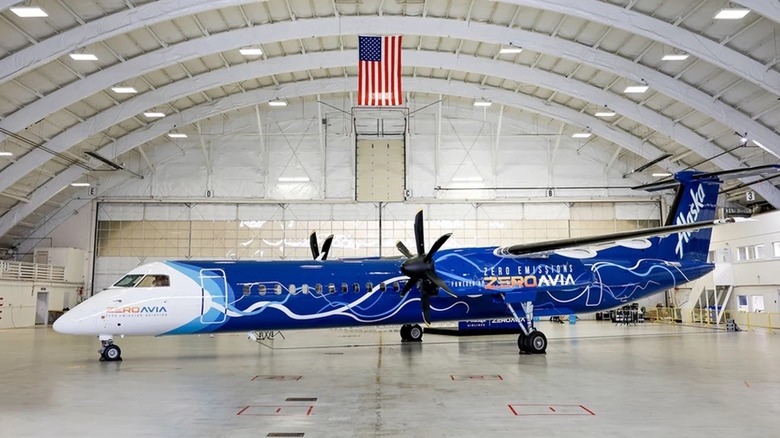 Alaska Airlines Q400 parked hangar