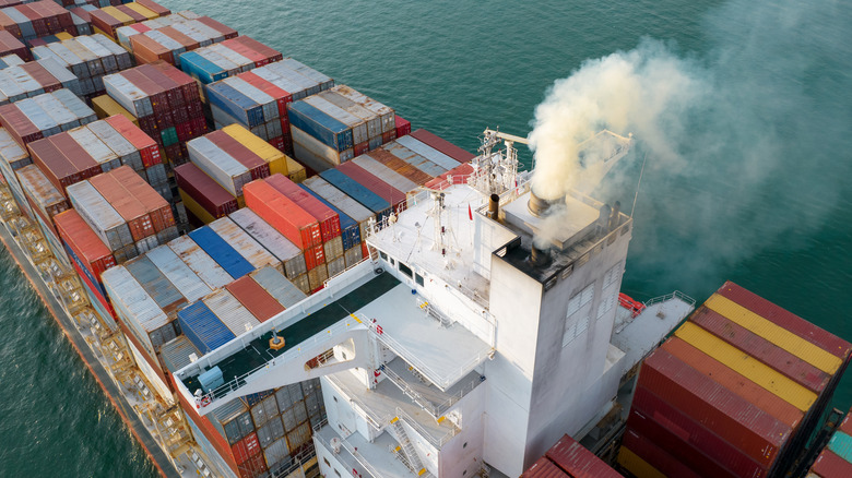 large cargo ship expelling exhaust