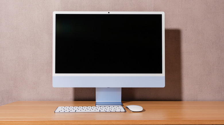 An Office With A PC That Is Turned Off
