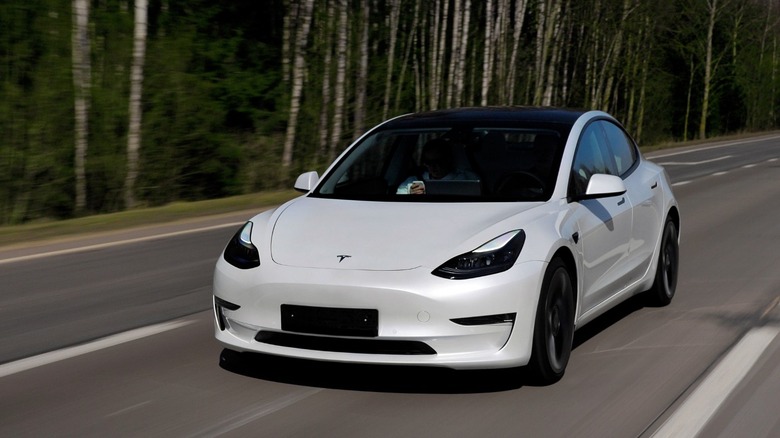 Tesla Model 3 highway driving