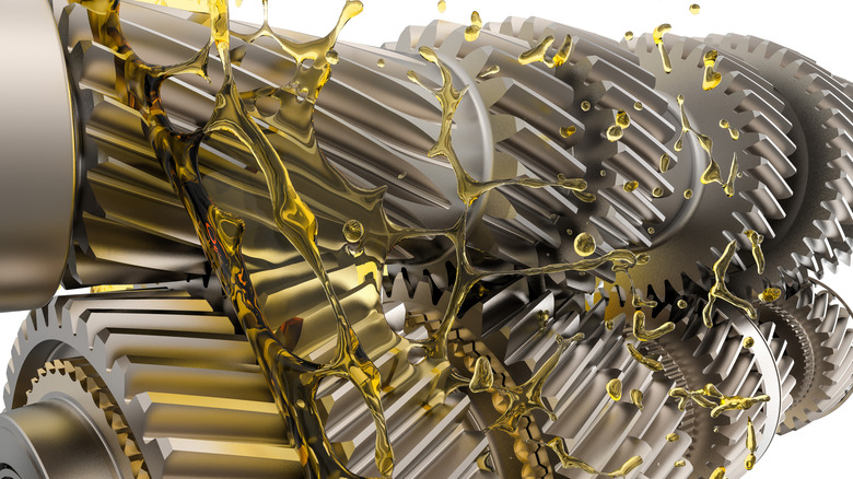Render of manual gearbox showing oil splashing, isolated on white background