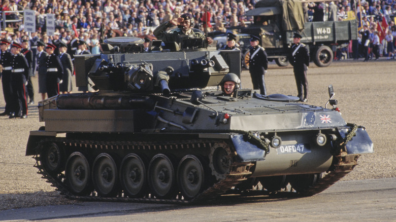 FV101 Scorpion viewed at some level of a navy parade
