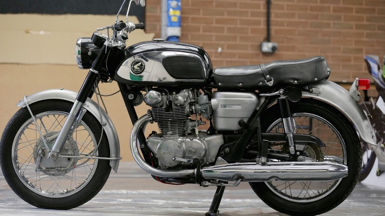 Honda CB450 Black Bomber parked garage