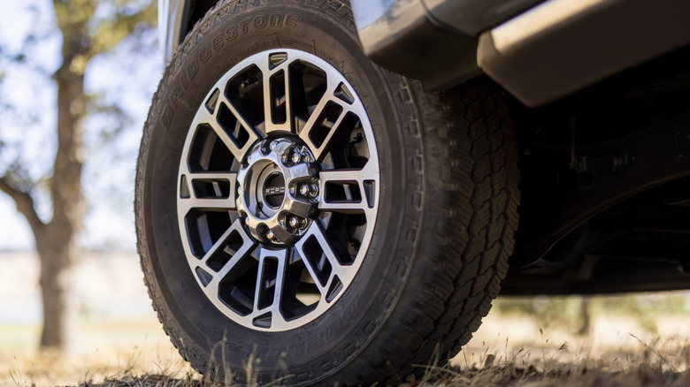 The front wheel of a Ford F-250 Super Duty, up close