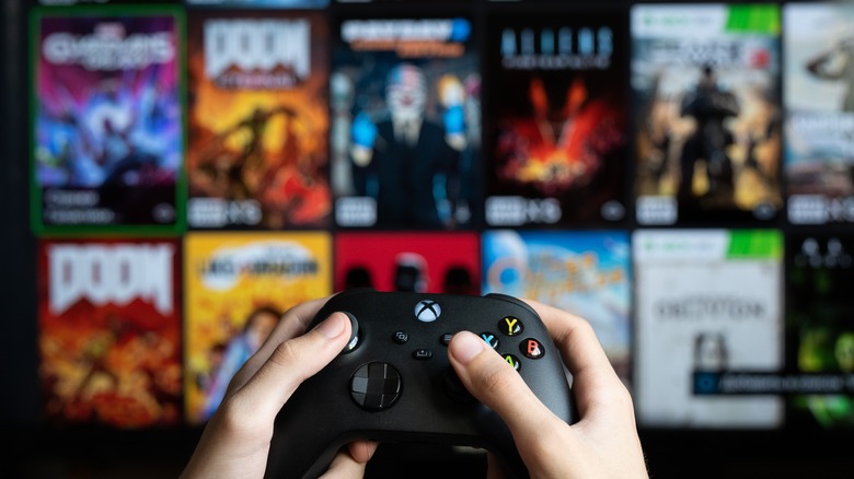 Someone browsing a list of Xbox games 