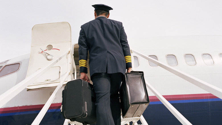 pilot boarding a plane