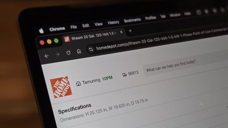 A MacBook displays the specifications page for a product on Home Depot