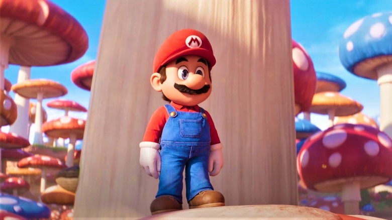Mario standing on a mushroom