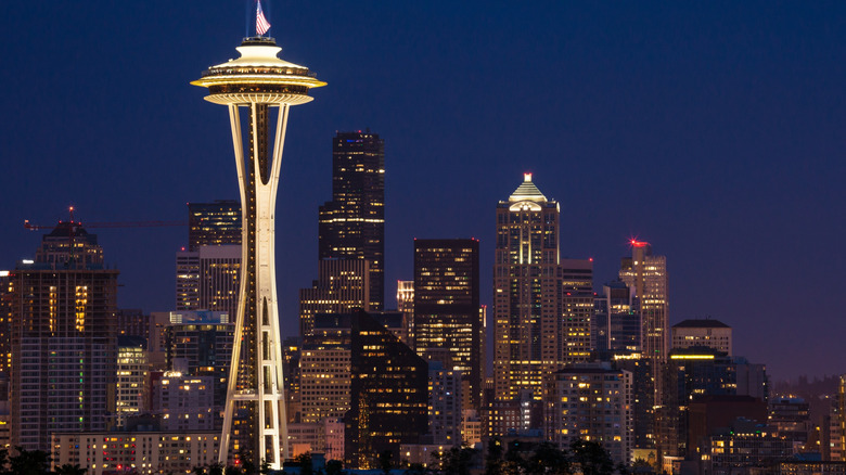 Nighttime view of Seattle with Space Needle in foreground