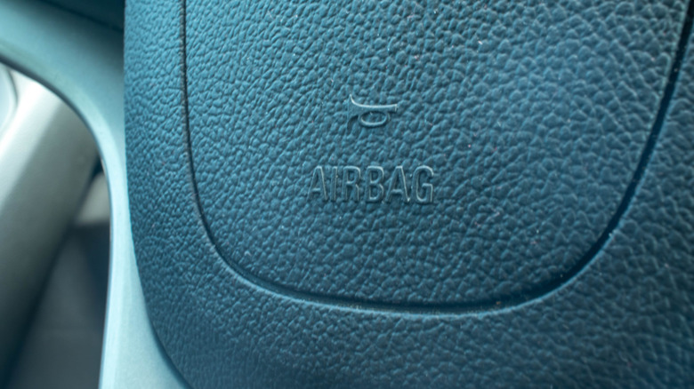 air bag marking on the dashboard of a vehicle
