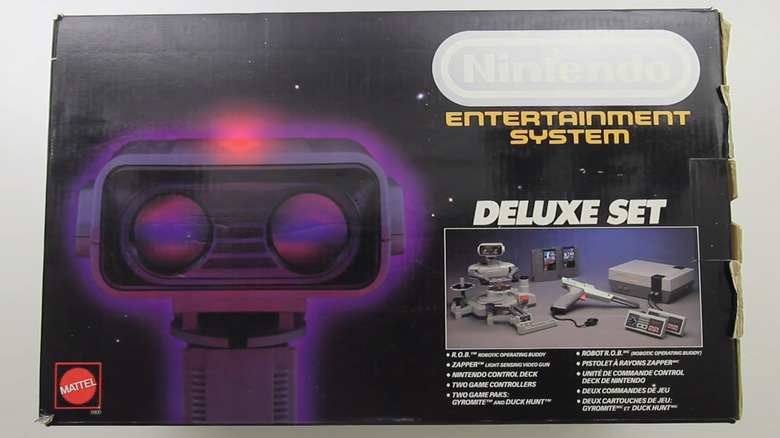 A boxed Nintendo Entertainment System Deluxe Set box showing ROB, the console, games, zapper, and controllers.