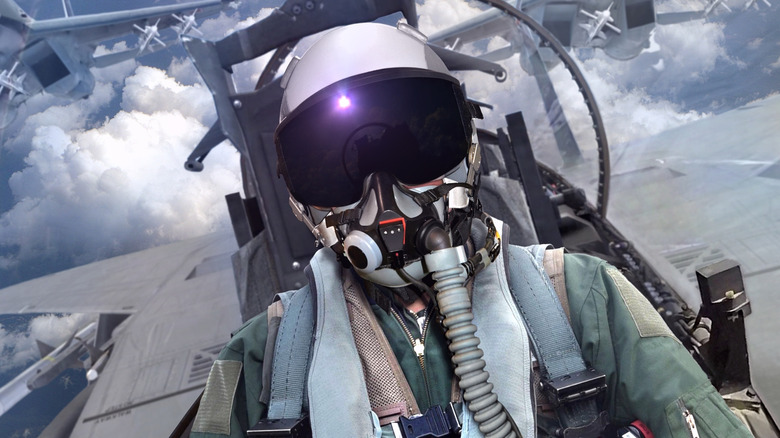 Jet fighter pilot in cockpit view with wingman support
