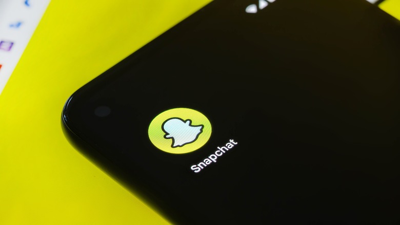 Snapchat logo on smartphone home screen