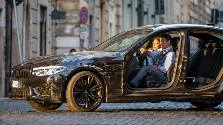Tom Cruise and Hayley Atwell in action scene during the filming of the movie "Mission Impossible 7"