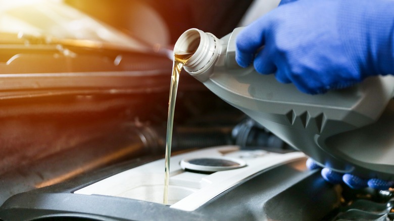 Engine oil being poured