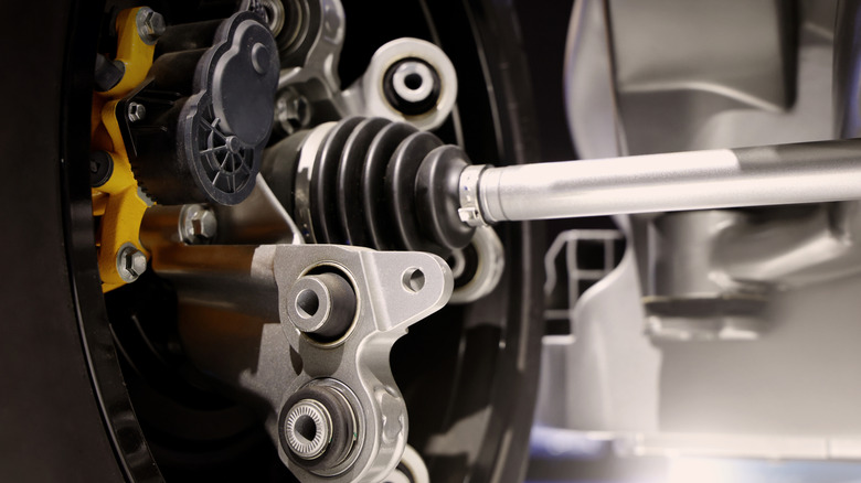 A close-up of a car's steering and suspension system.