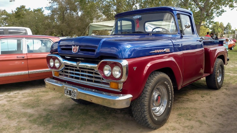 Old red and blue Ford F-100
