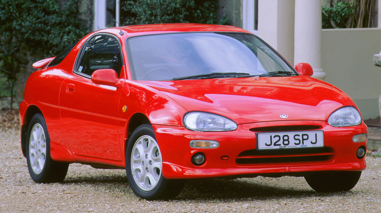 red mazda mx-3 car