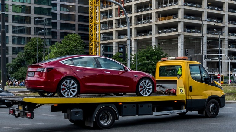 tesla on tow truck