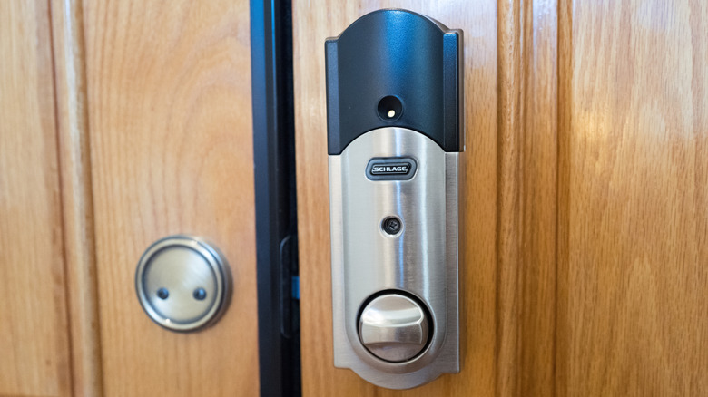 A smart lock installed on an entry door