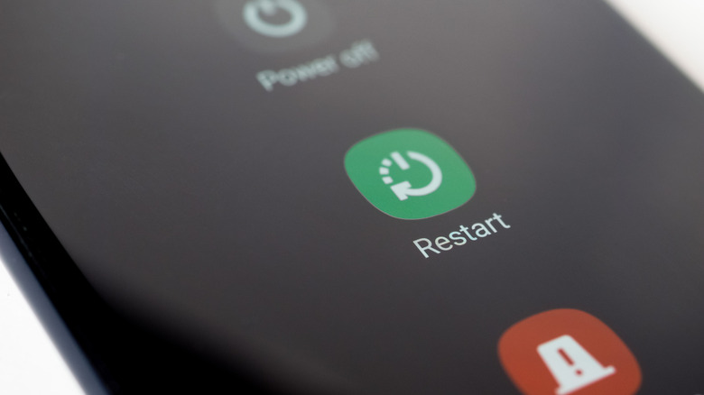 A smartphone showing the restart option