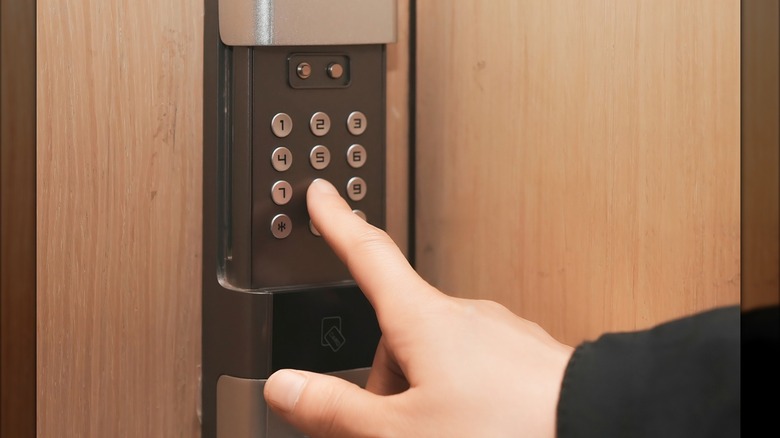 A smart lock keypad with external power terminals for use with a backup 9 Volt battery