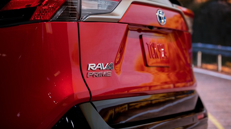 Upclose of RAV4 Prome logo on red car