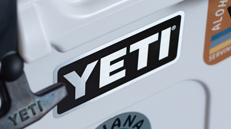 The Yeti logo on a white cooler.