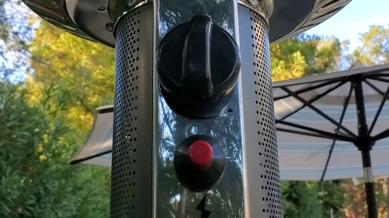 The dial and igniter of an Amazon Basics patio heater.