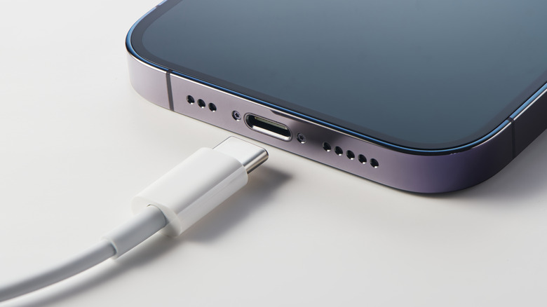 Close-up of iPhone charging port with USB Type-C cable