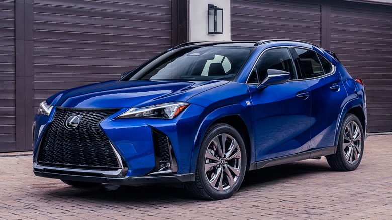 Front 3/4 view of Lexus UX ion upscale residential setting