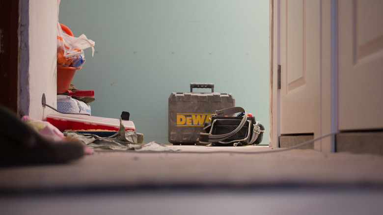 DeWalt gear outside drywall construction