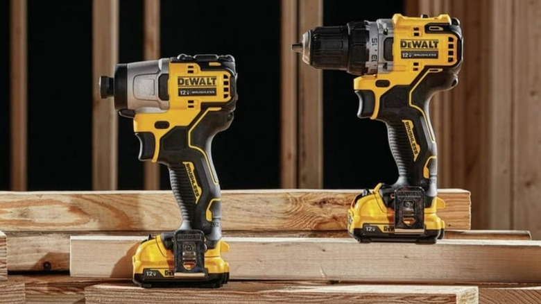 DeWalt drill and impact driver on lumber