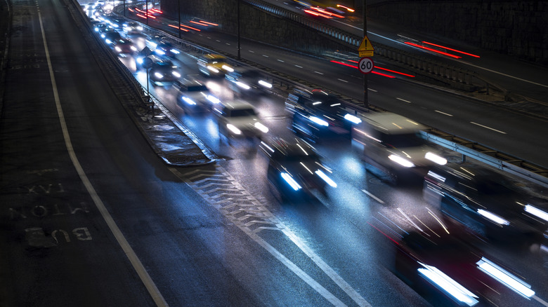 High-speed traffic on a Polish highway at night.