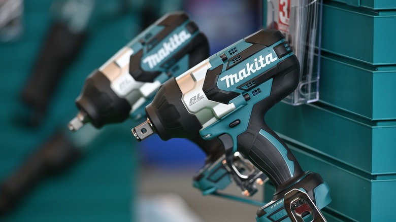 Makita drills hung on the wall