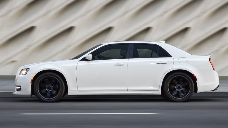 White Chrysler 300 driving