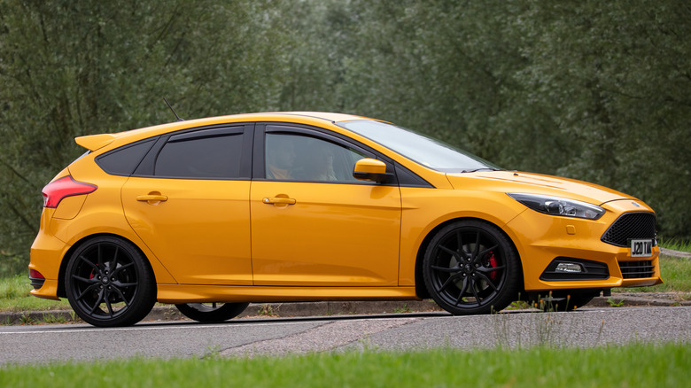 Yellow Ford Focus parked