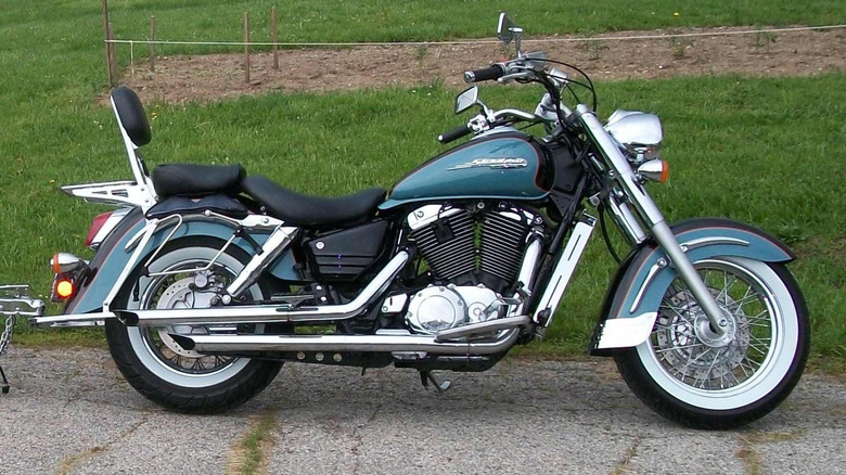 Teal Honda VT1100 Shadow Aero parked in driveway